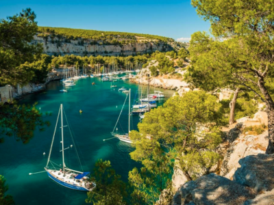 Sailing boats moored in a calanques in the South of France