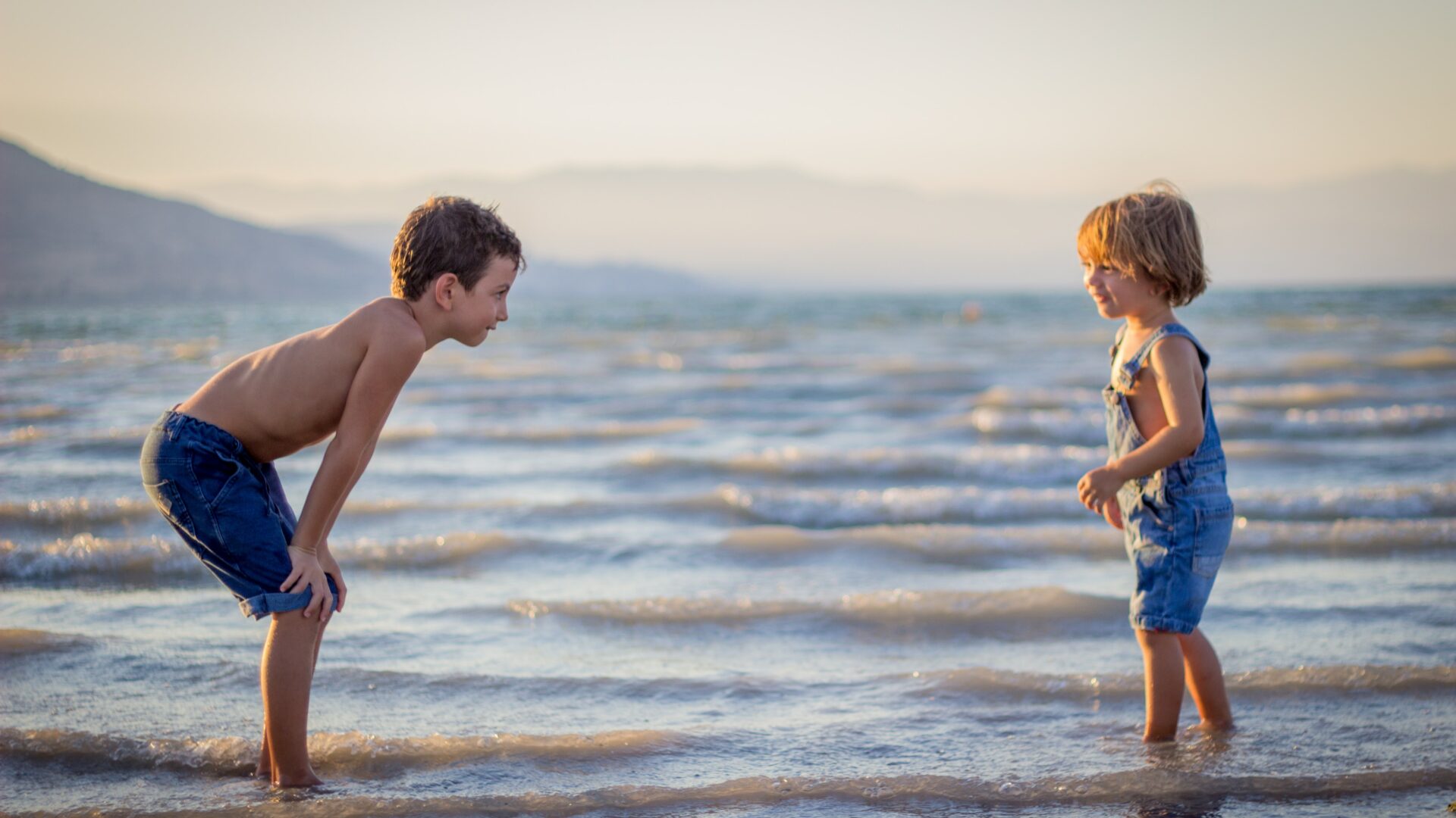 Two children playing in the water