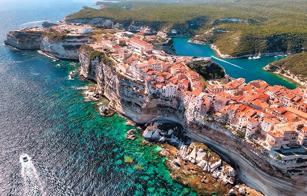 Breathtaking landscapes of Corsica, where rugged mountains meet the crystal-clear Mediterranean Sea