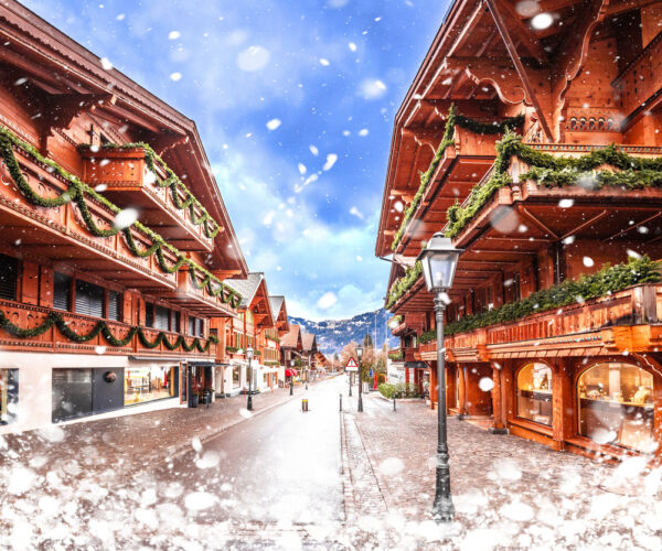 Idyllic Alpine village snowing street view, luxury winter destination