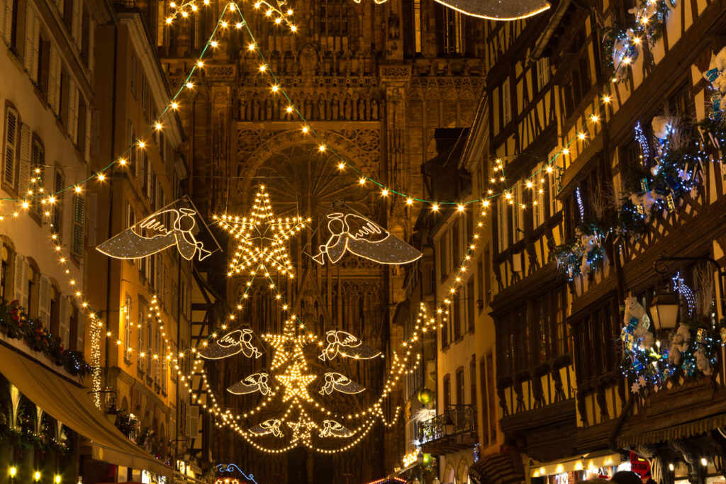 Strasbourg Christmas Market in Alsace, France, featuring festive lights, historic architecture, decorated wooden chalets, and the magical atmosphere of one of the world’s most renowned Christmas markets.